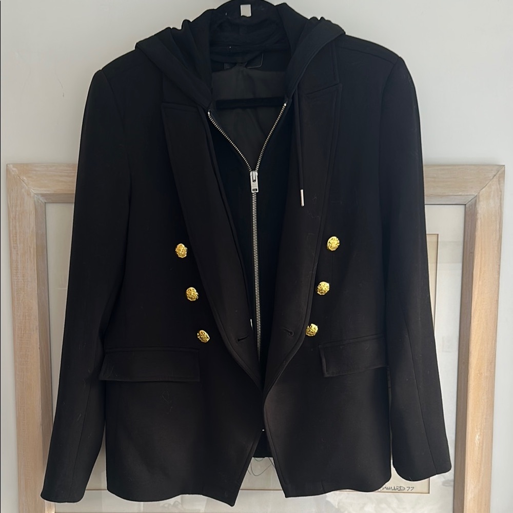 Black blazer with gold buttons and removable hood and sweatshirt zip up.